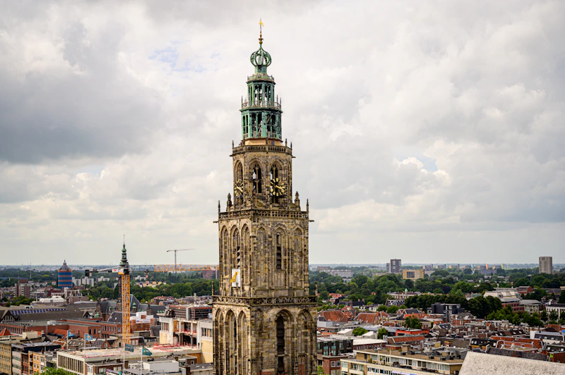 a tall tower with a clock on top of it